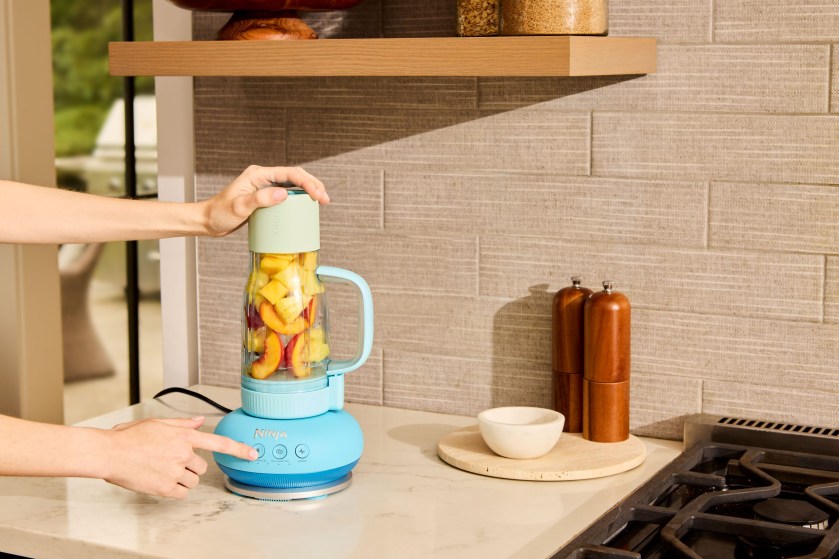 JPG-R_DB351UKBL_InUse_Kitchen_OnCounter_PreMix_Hands-scaled