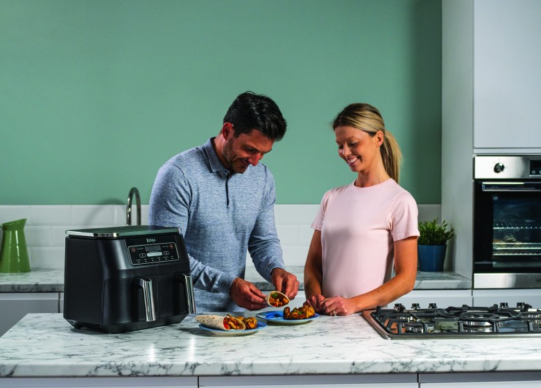 Ninja_Foodi_AF300UK_Couple_Serving_Food_012_246_CMYK-1-scaled